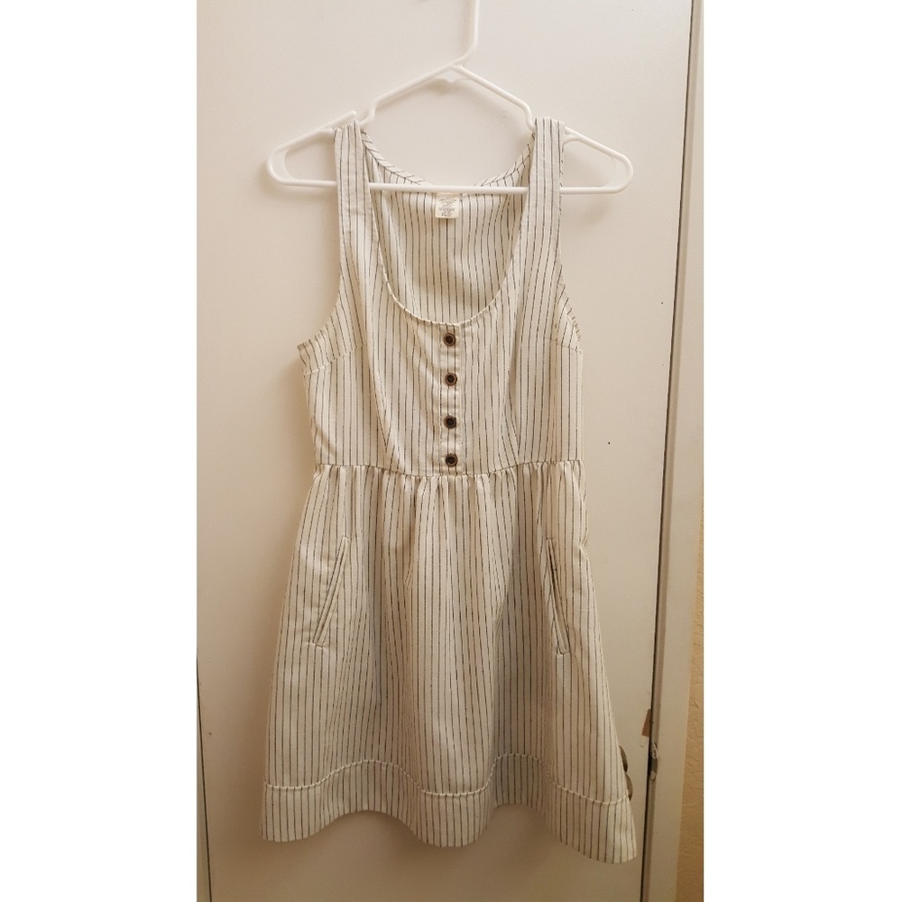 Cope Linen dress cream colored with pockets